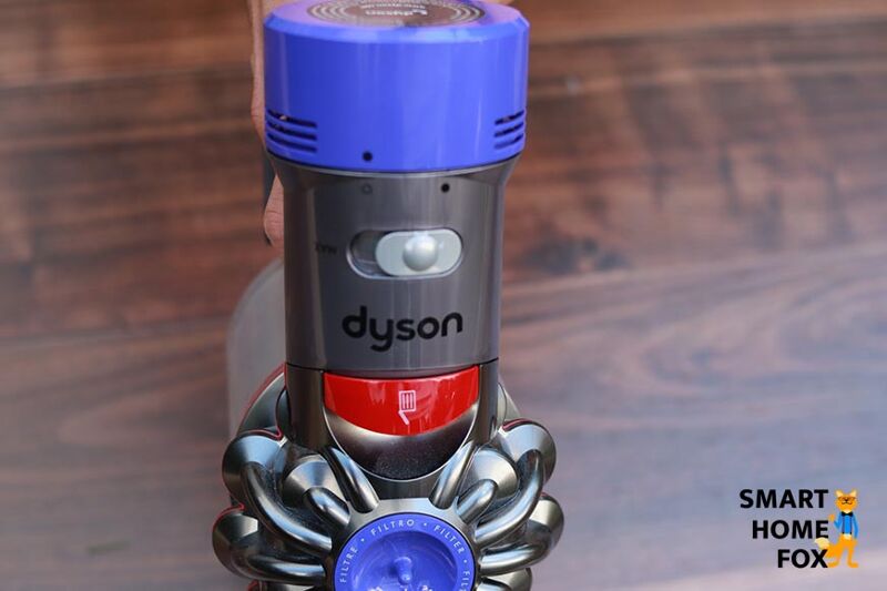 The switch on the Dyson V8 to change the suction levels.
